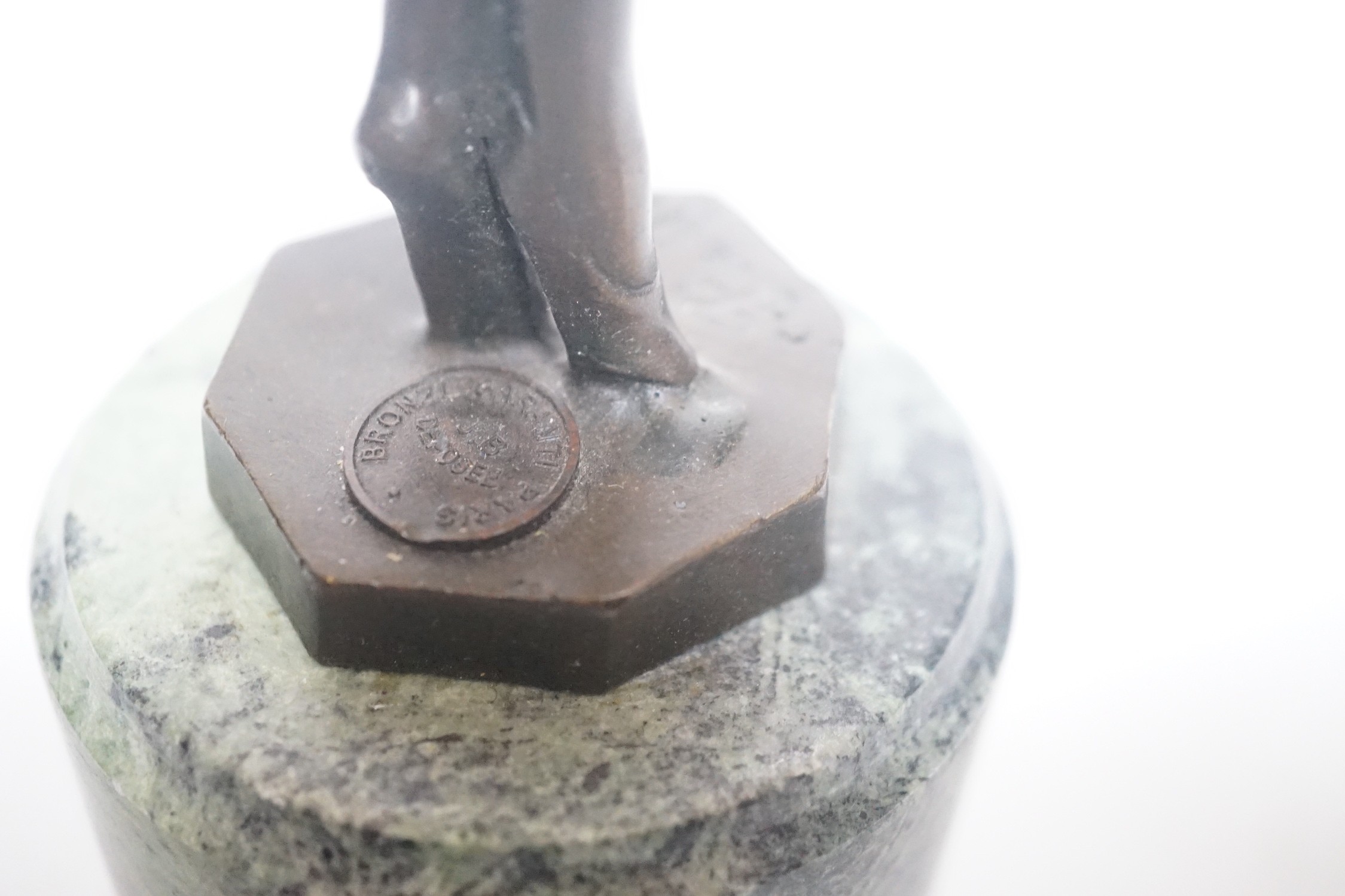 After Ferdinand Preiss (1882-1943), a bronze of a curtsying girl, on marble base, 27cm